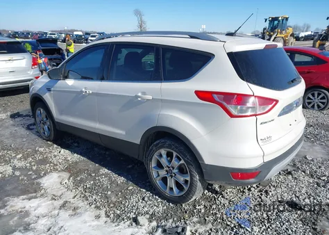 2014 Ford Escape Titanium z USA, uszkodzony, nr VIN 1FMCU0J99EUA91053